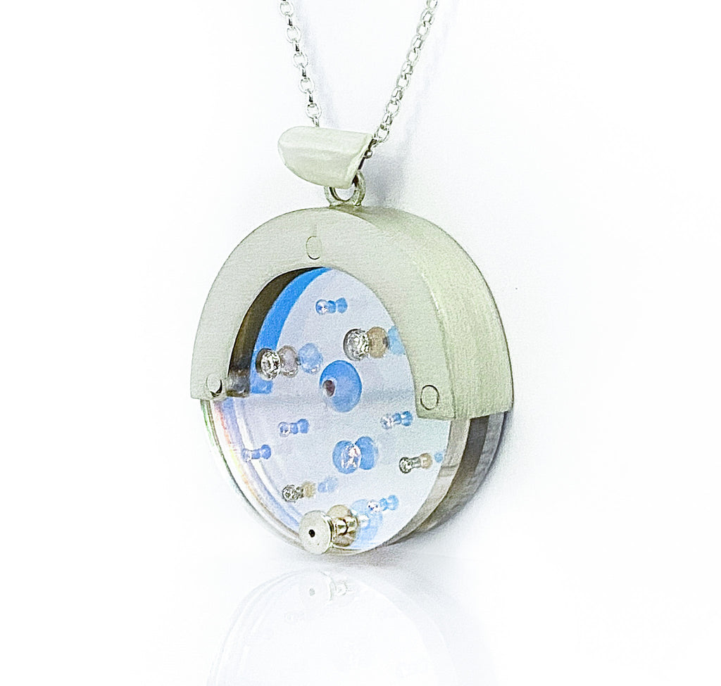 Reflections of Duality Pendant